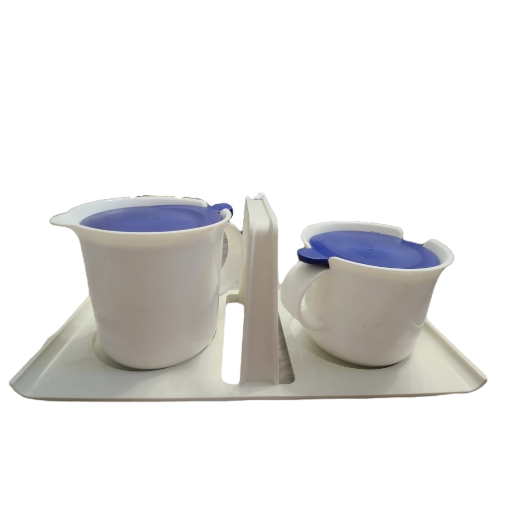 Vintage Tupperware cream and‎ sugar set